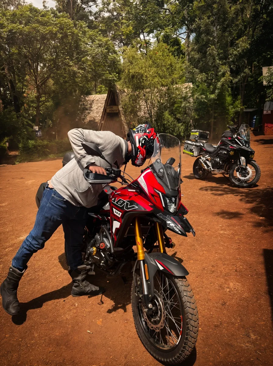 Red ADV 300 motorcycle at forest checkpoint
